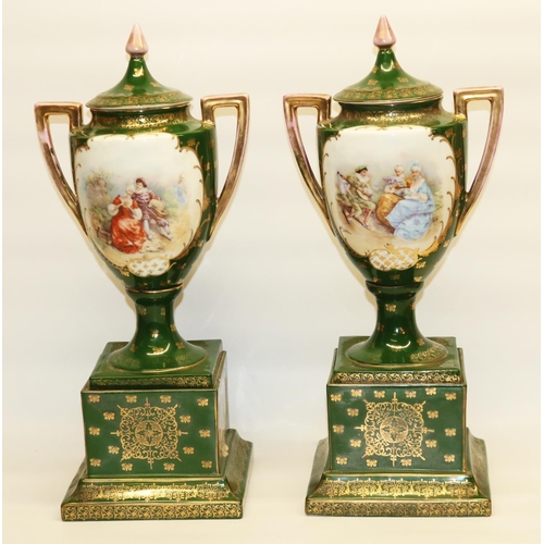 481 - Pair of large Royal Vienna style twin handled pedestal urns and covers decorated with figural scene ... 