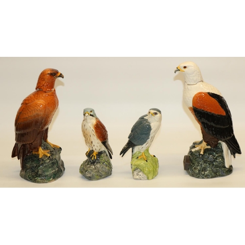 409 - Royal Doulton Birds of Prey decanters: Fish Eagle brandy decanter, and three Whyte & Mackay whisky d... 