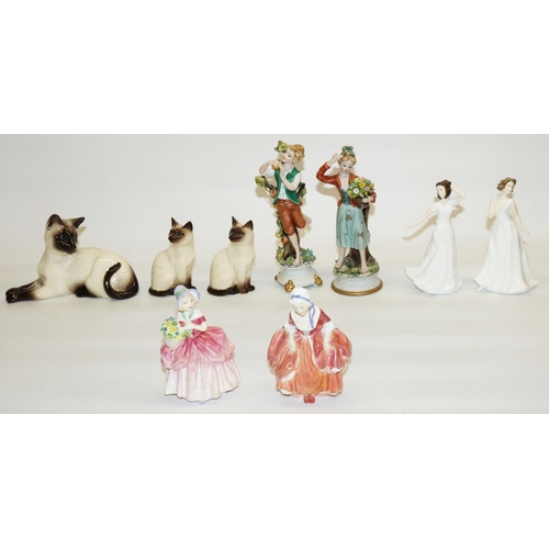 412 - Three Beswick Siamese cats, two Capodimonte figures, and four Royal Doulton female figurines: 'Goody... 