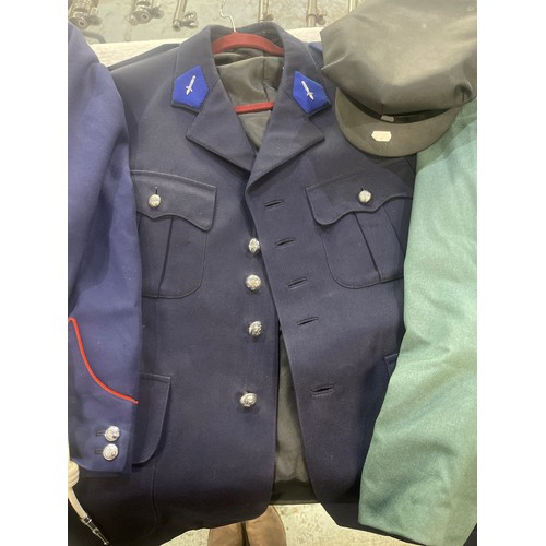 159 - West German police tunic, two Belgium tunics and a peak cap