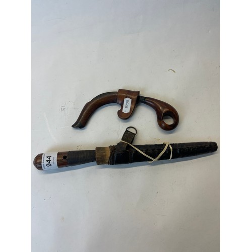 944 - Karambit fighting knife with finger loop to wooden handle, curved blade approx L10cm, in wooden shea... 