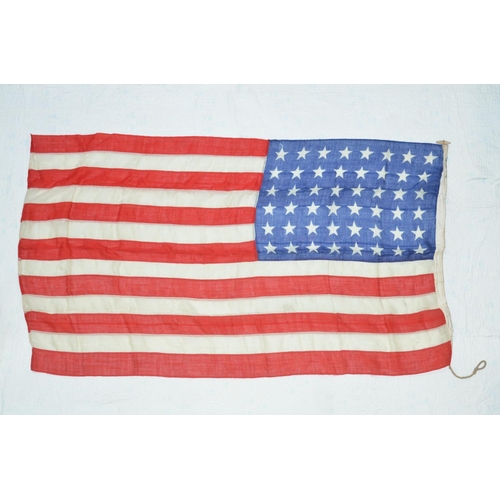 363 - Pre-1959 US flag with 48 stars with wood peg and halyard. Size: Approx 177x100cm