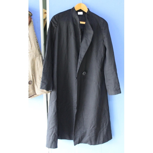 342 - Black ladies evening coat with single button, black cotton liner, and heavy duty ladies winter jacke... 