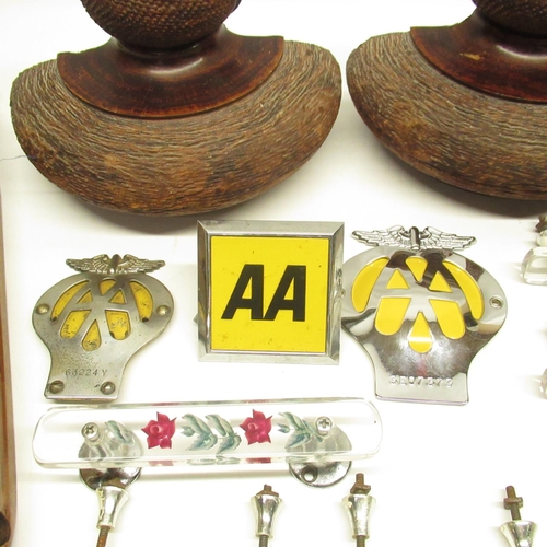 557 - C20th glass door handles with encased ceramic hand-painted flowers (9), 3 AA car badges, a loom shut... 