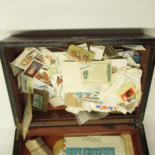 568 - C20th writing box (a/f) containing mixed stamps and cigarette cards