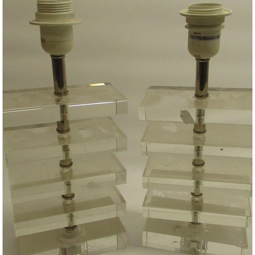 438 - Pair of graduated openwork glass table lamps