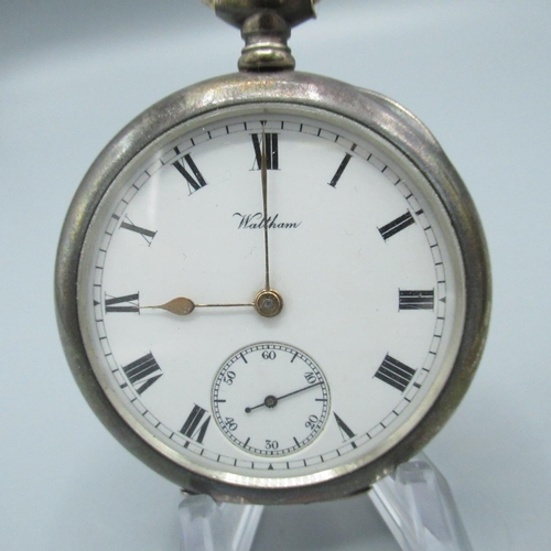 57 - Two Waltham Traveller silver open face keyless wound and set pocket watches, signed white enamel Rom... 