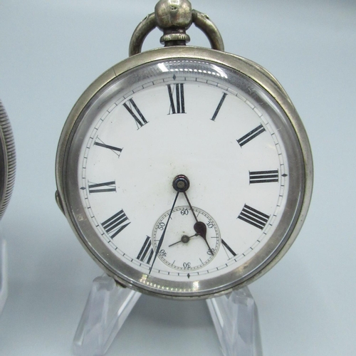 66 - Retailed by J. W. Benson of London, Swiss silver open faced key wound and set pocket watch, Swiss cy... 