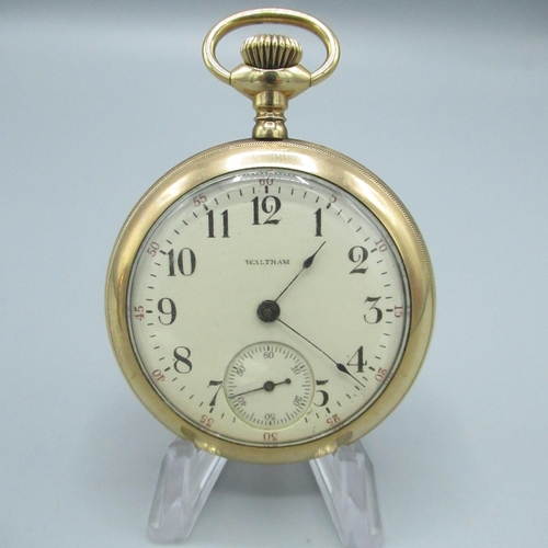 73 - Waltham rolled gold open faced keyless wound and set pocket watch, signed white enamel Roman dial, c... 