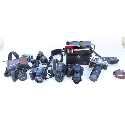 1246 - Collection of cameras and camera equipment and accessories to include Canon AE-1 with Vivitar 75-205... 