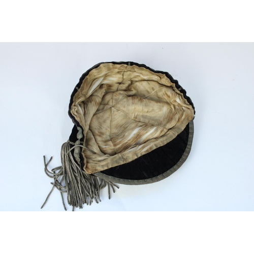 1278 - C20th velvet and silver bullion thread school or sports cap with woven crest in Latin for Neath, Sou... 