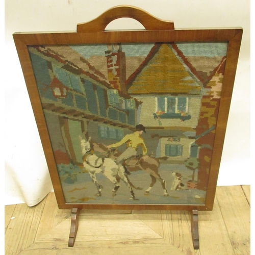 449 - 1930s walnut framed fire screen with wool work panel