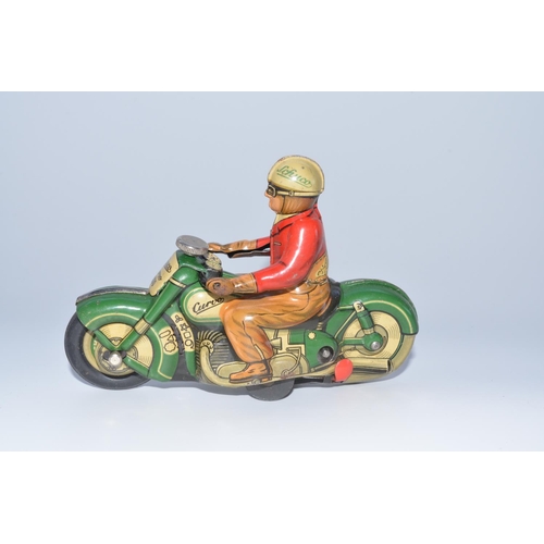 1284 - Schuco Curvo 1000 early 1950s tinplate clockwork motorcycle with original box and instruction sheet,... 