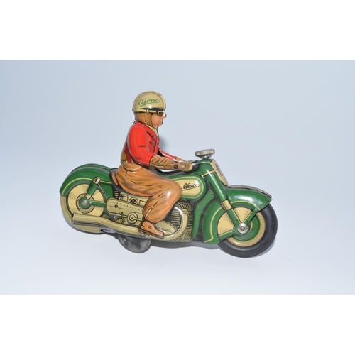 1284 - Schuco Curvo 1000 early 1950s tinplate clockwork motorcycle with original box and instruction sheet,... 