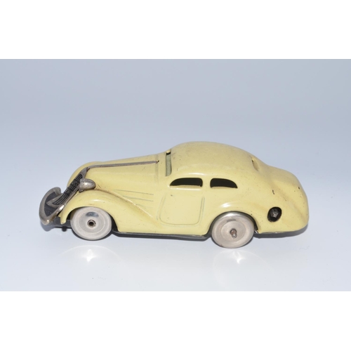 1287 - Schuco Mirako 1001 post war tin plate clockwork car model with working mechanism, no key, very good ... 