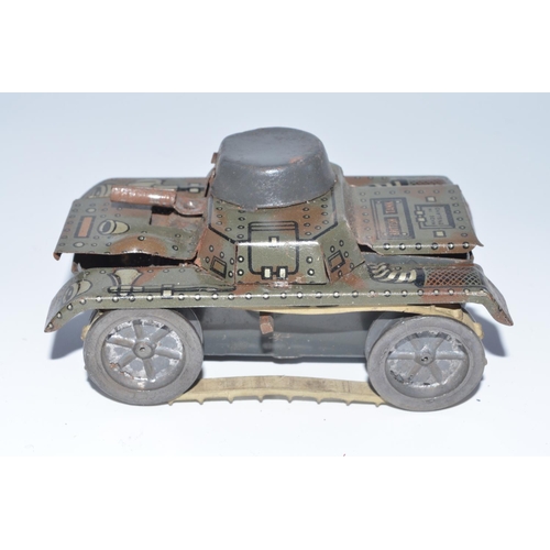 1290 - Vintage English tinplate clockwork model tank, with intact rubber tracks in full and fair working or... 