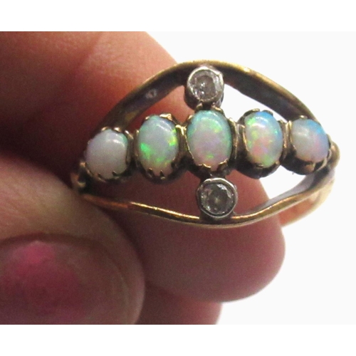 1263 - Unmarked yellow metal ring set with opals and diamonds, size P1/2, a single 9ct yellow gold earring ... 