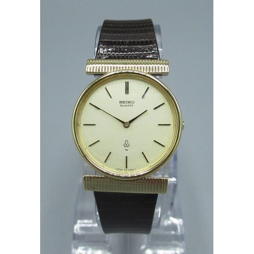 102 - Seiko SQ quartz wristwatch in gold plated case, original Seiko strap with watch tag, snap on stainle... 