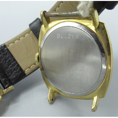 607 - Bulova hand wound wristwatch with signed dial, gold plated cushion case, with snap on stainless stee... 