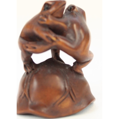 1359 - Japanese Meiji period boxwood Netsuke figure of two frogs, H4.5cm and a fish Netsuke