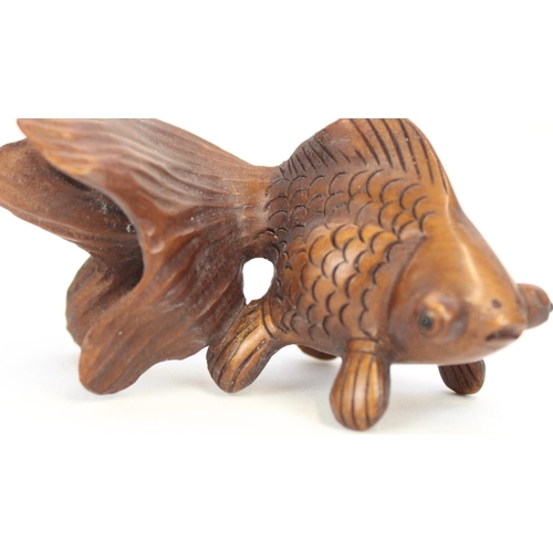 1359 - Japanese Meiji period boxwood Netsuke figure of two frogs, H4.5cm and a fish Netsuke