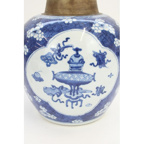 1363 - Chinese Kangxi period porcelain jar decorated in underglaze blue with a prunus and cracked ice backg... 