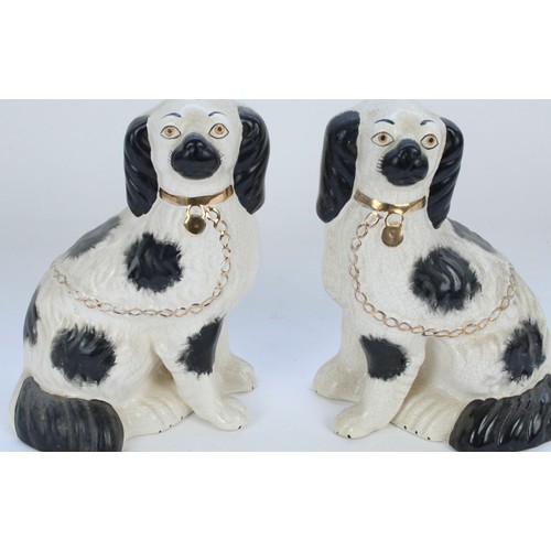 439 - Pair of Staffordshire pottery 'Jackfield' seated dogs, and another pair of Staffordshire seated dogs... 