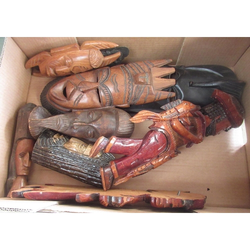 3 - Collection of various carved wood tribal busts and figures, some with painted detail, beads, feather... 