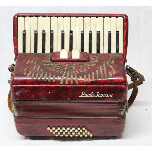 9 - Paolo Soprano accordion with intact key board and buttons, scroll work design with good intact bello... 