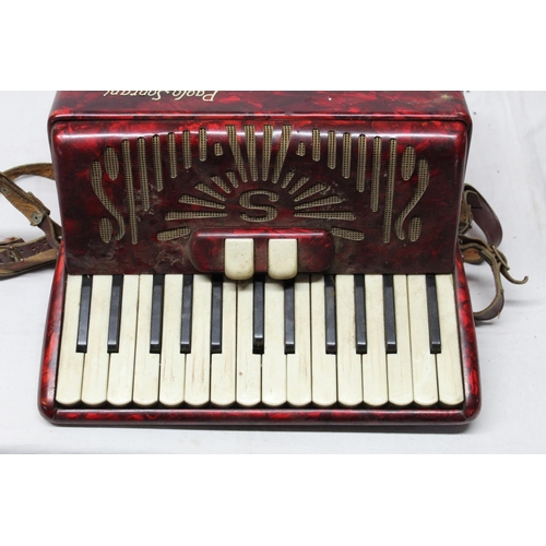 9 - Paolo Soprano accordion with intact key board and buttons, scroll work design with good intact bello... 