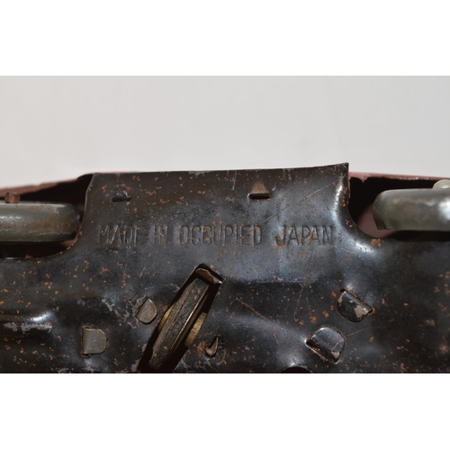 12 - Vintage post WWII clockwork metal car stamped 