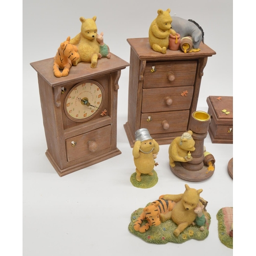 729 - Collection of Border Fine Arts Classic Pooh figures,  pencil case, chest of drawers, clock, Pooh's W... 