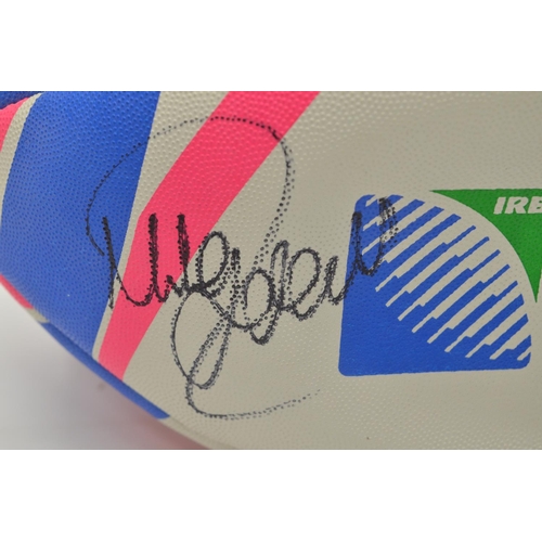 736 - 2015 Rugby World Cup rugby ball signed by ex-England player Mike Tindall.