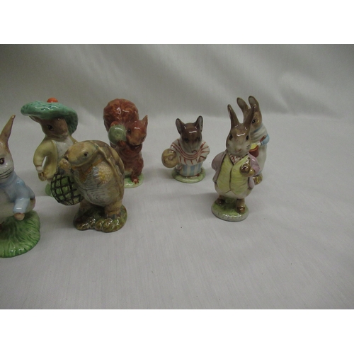 61 - Ten Beswick Beatrix Potter figurines including 