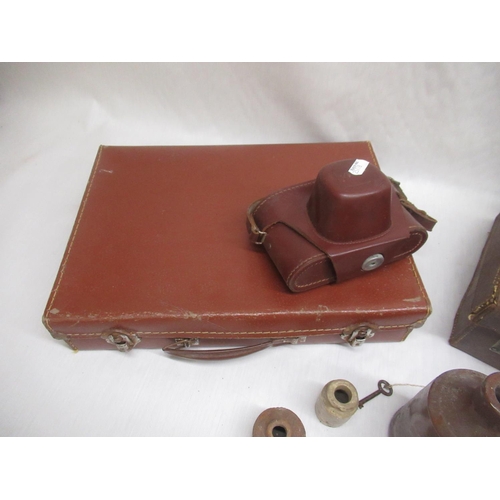 81 - Leatherette camera case, two leather Masonic cases, one embossed G.M. Cross, and seven stoneware bot... 