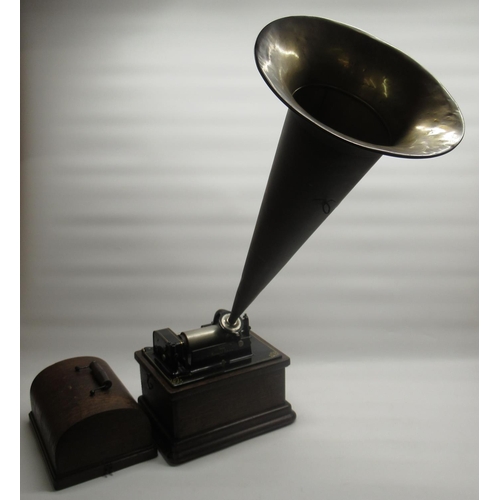 216 - Eddison combination fire side phonograph with brass witches horn and a selection of cylindrical phon... 