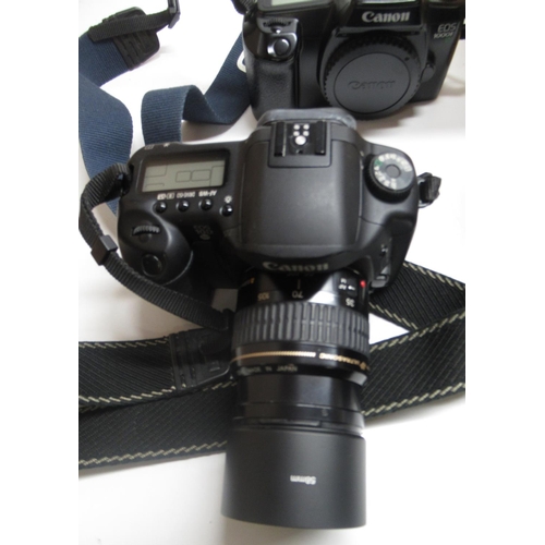 219 - Seletion of cameras , lenses, accessories and other equipment including Canon EOS 1000F, Canon EOS 1... 