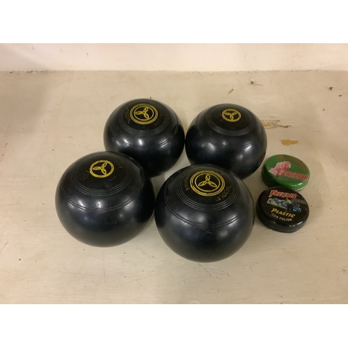 197 - Four Bowling balls with leather bag