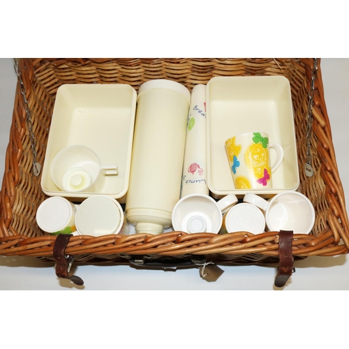 644 - Antler picnic hamper containing settings for four including cups, cutlery, flask, plates, etc., 56x3... 