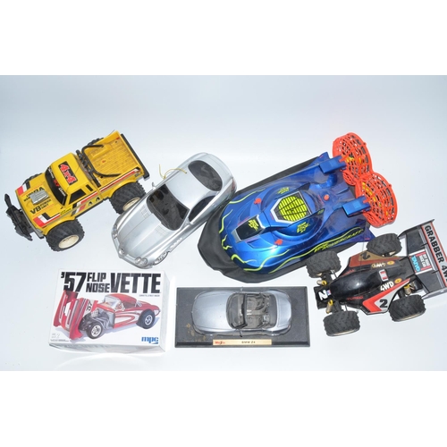 766 - Collection of used radio controlled cars and a hovercraft, no transmitters. Includes a vintage Tamiy... 