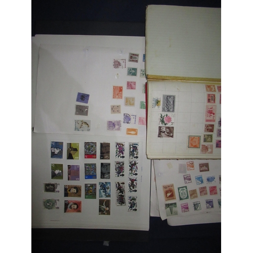 306 - Collection of stamps used and mounted in two albums, all world, with a few loose leaves, together wi... 