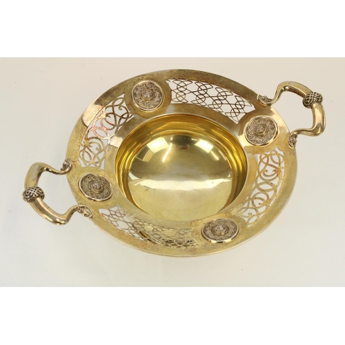 1333 - Edw. VII Arts and Crafts hallmarked silver gilt two handled pedestal bowl, decorated throughout in N... 