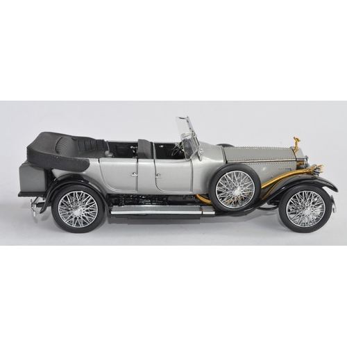 1396 - Two Franklin Mint 1/24 die-cast car models:
A boxed 1925 Rolls Royce Silver Ghost (no paperwork), mo... 