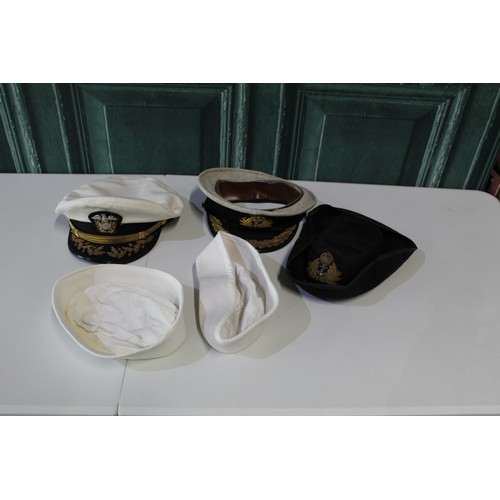 816 - Collection of Naval hats inc. two US ratings caps, Royal Navy officers peaked cap with acorn oak lea... 