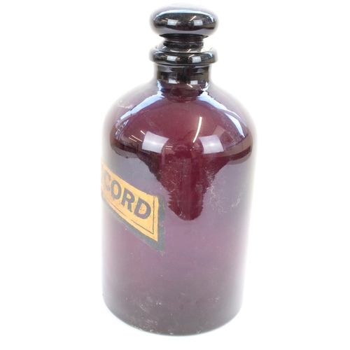 1302 - C19th Apothecary Chemists purple glass bottle with painted label for 'Sp.Anisi'Cord', H35cm