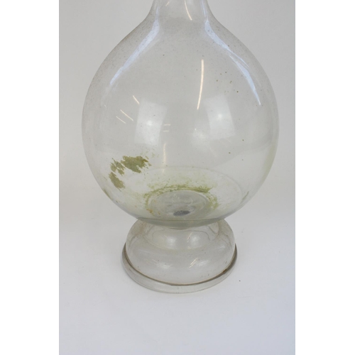 1303 - C19th chemists apothecary tall glass Carboy in bottle form with domed foot and faceted pear shape st... 