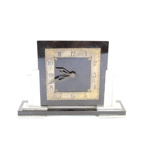 1315 - Art Deco ABEC chrome plated and black glass mantel timepiece of ziggurat form with applied chapter r... 