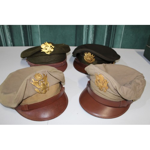 818 - Four US airforce peaked caps with brass badges, brown leather peak, two khaki one chocolate and one ... 