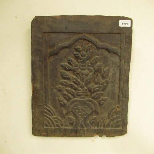 1229 - C18th oak panel carved in relief with floral motif, W34cm H41.5cm