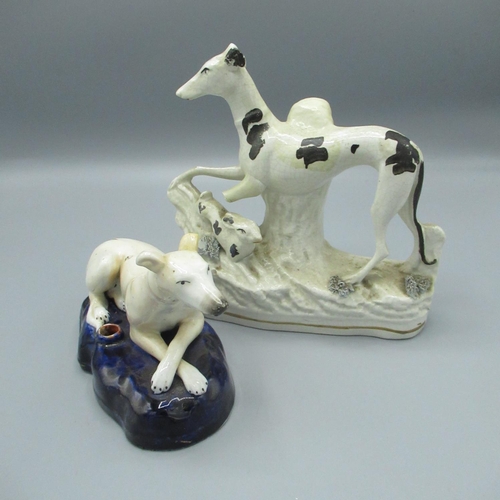 1368 - 19th C Staffordshire pen holder in the form of a seated greyhound with crossed paws, another Staffor... 